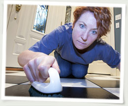 woman scrubbing floor